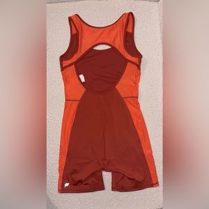 Fabletics the khloe edition motion 365 open back onesie.